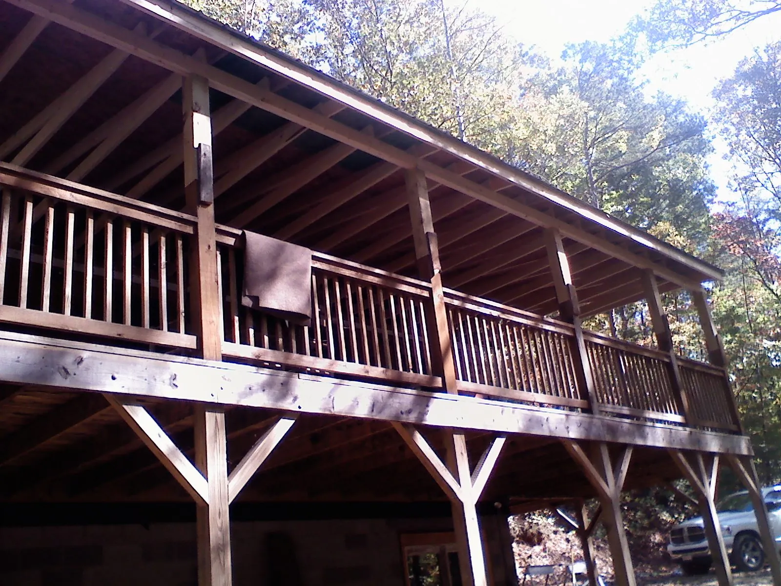 Timber framing under a new elevated porch and deck — Roof Leak Repair in Universal City by Roofing Brothers